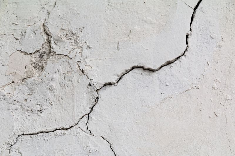 Cracks, holes, or crumbling plaster can weaken walls and ceilings.